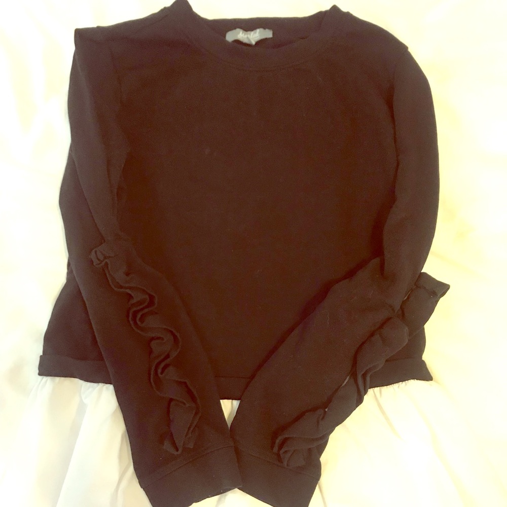 Cute black sweatshirt top with white shirtwaist